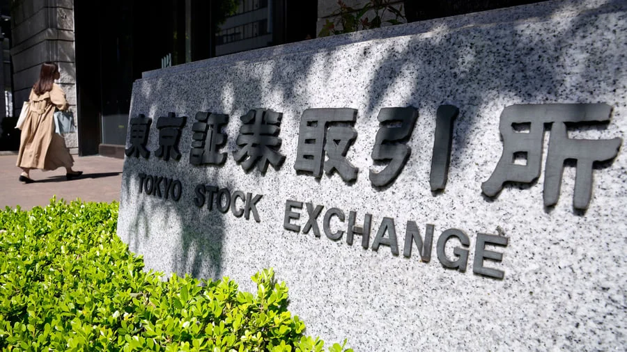 Asian Markets Navigate Uncertainty Ahead of Federal Reserve Chair’s Key Speech
